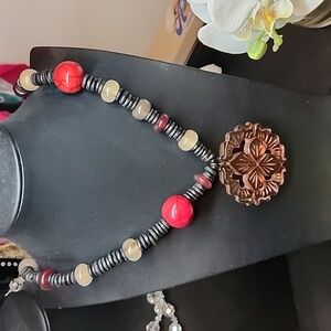 Beaded Chicos necklace with floral medallion